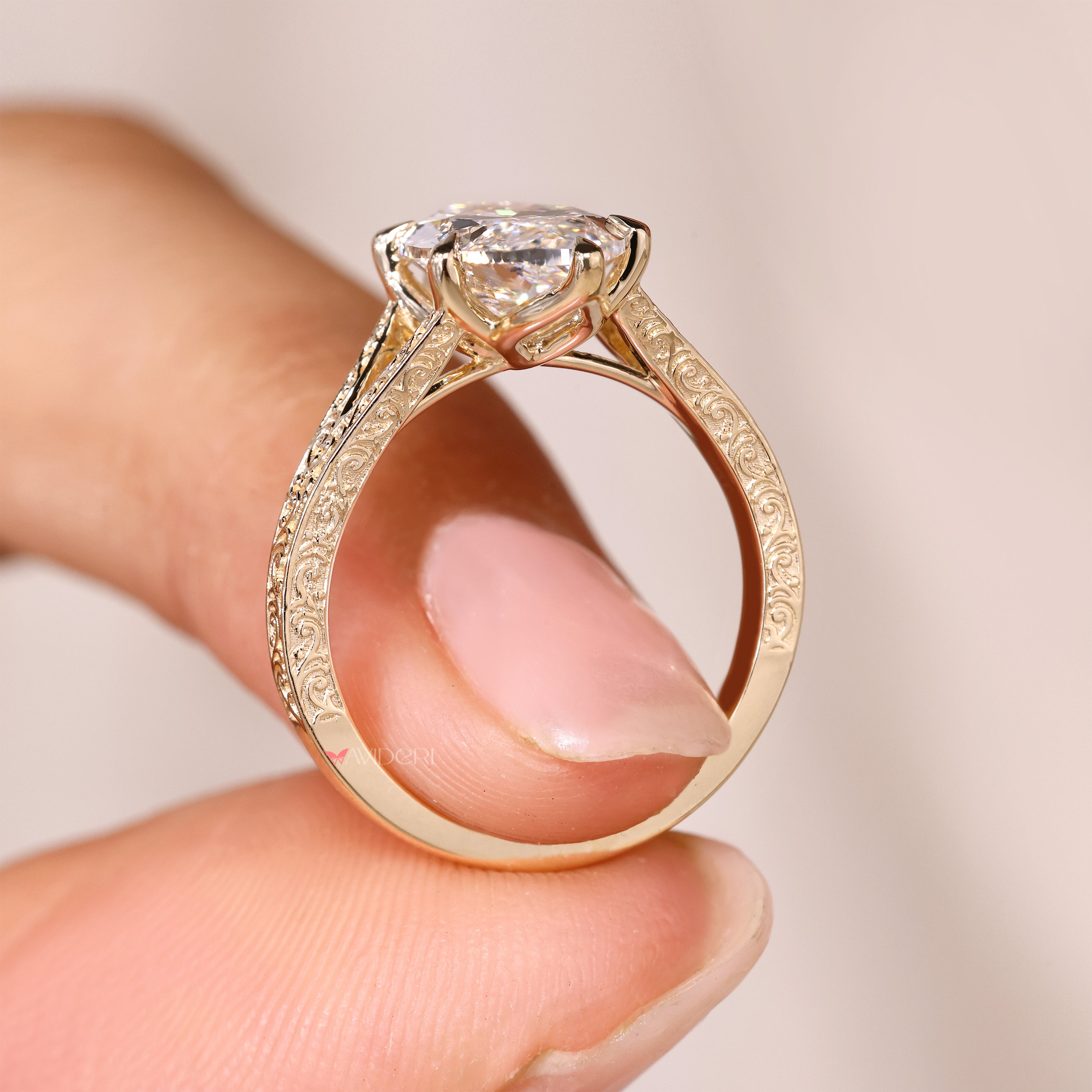 Marquise solitaire ring with tulip basket style.
