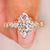 Marquise diamond ring with pear round pave style.
