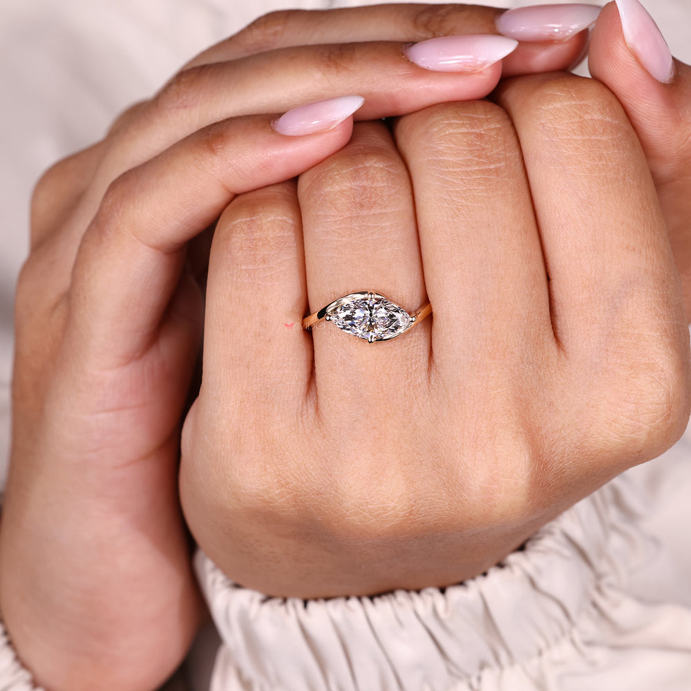 Handmade marquise diamond engagement ring.
