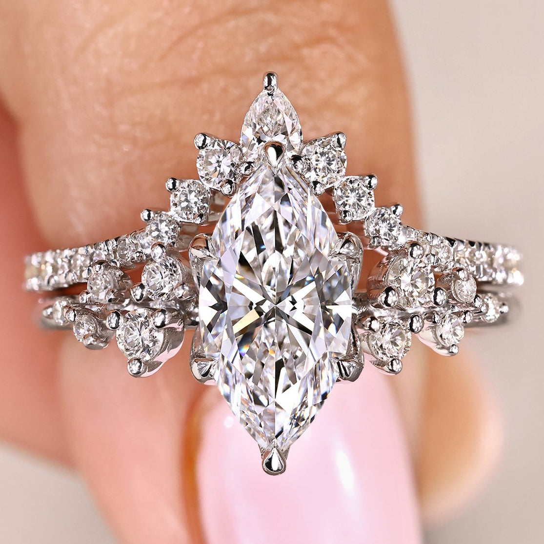 Marquise engagement ring set with curved semi eternity wedding band
