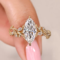 Marquise Cut Diamond Ring with Marquise and Round Side Stone