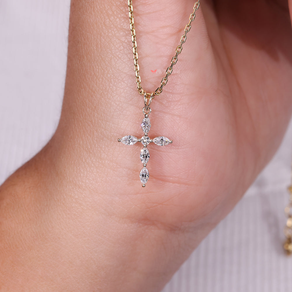 Cross shaped pendant with round diamonds.
