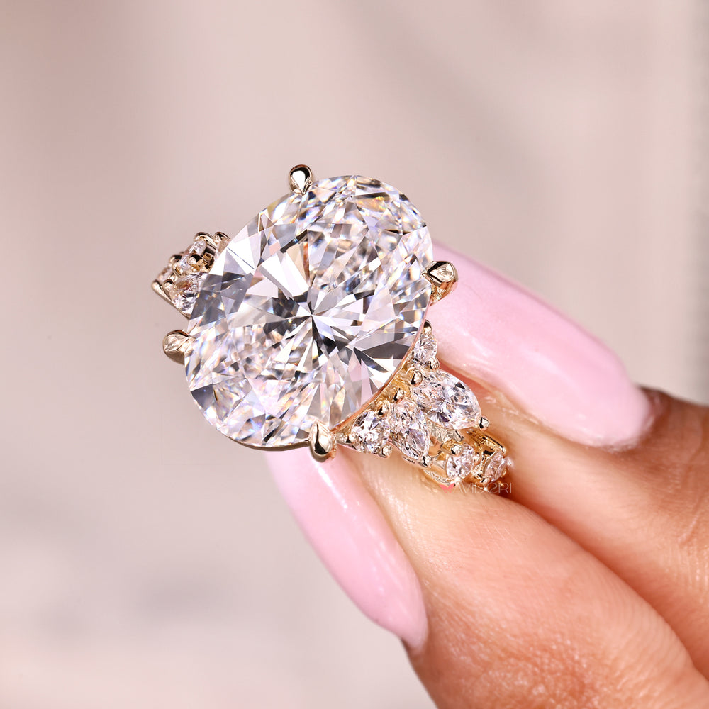 Cluster setting oval cut lab grown diamond ring.
