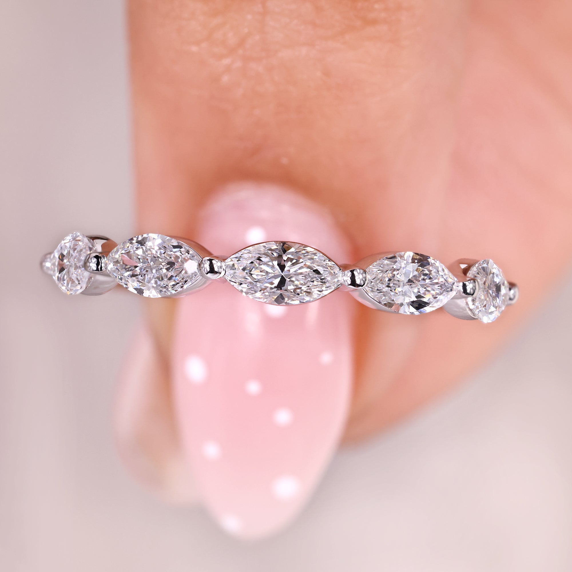 Diamond wedding band in marquise diamond wedding band style.