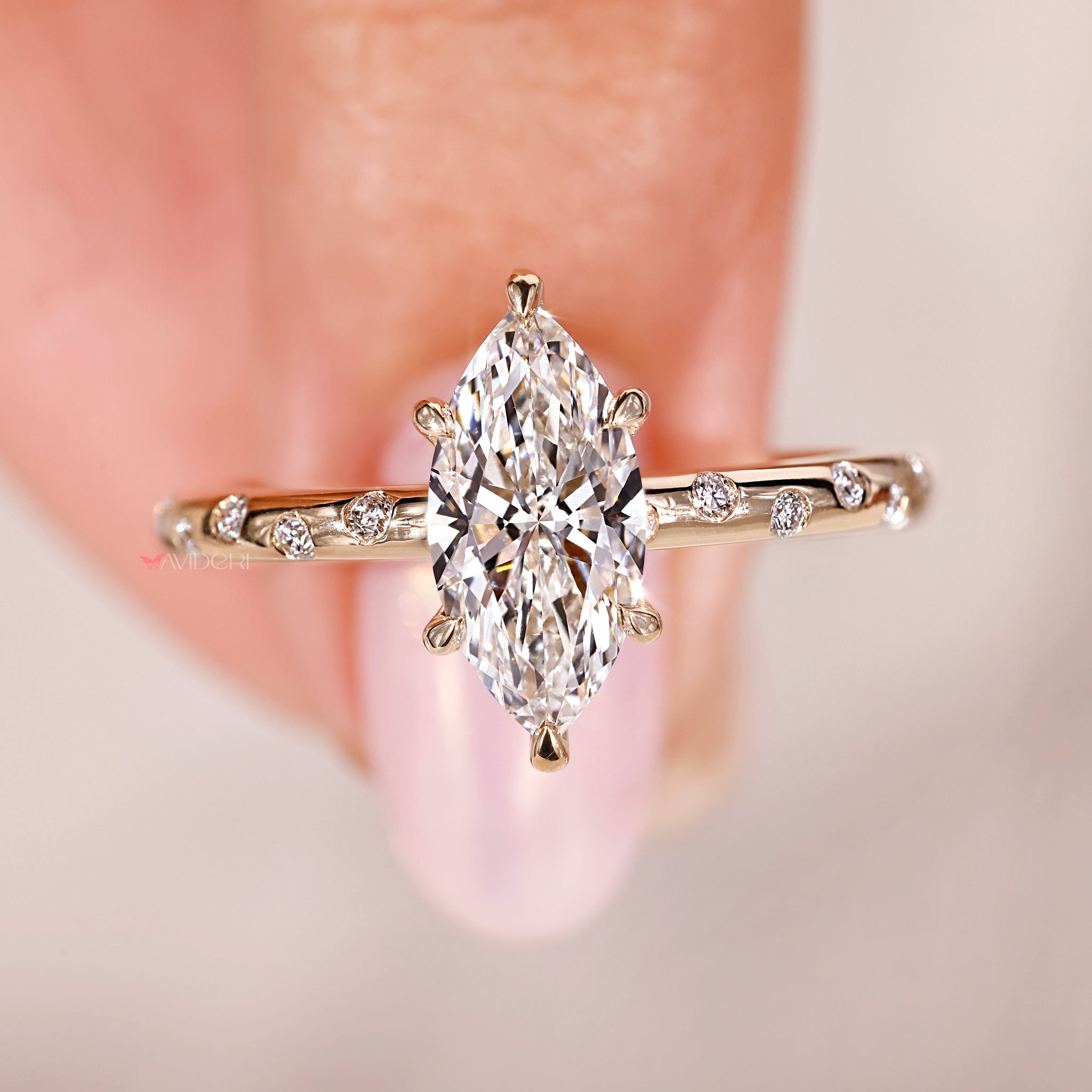 buy engagement ring with lab grown marquise and round diamonds in flush setting.