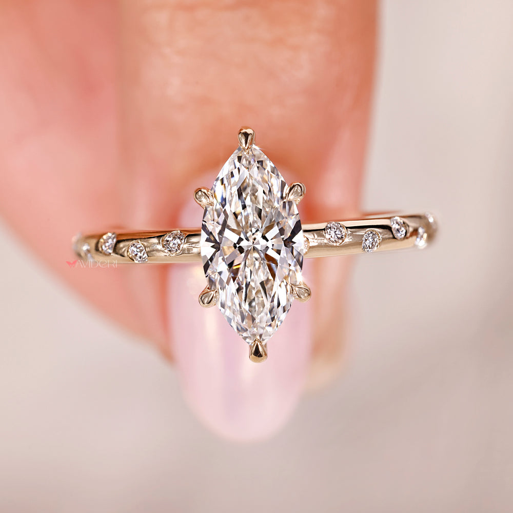 buy engagement ring with lab grown marquise and round diamonds in flush setting.