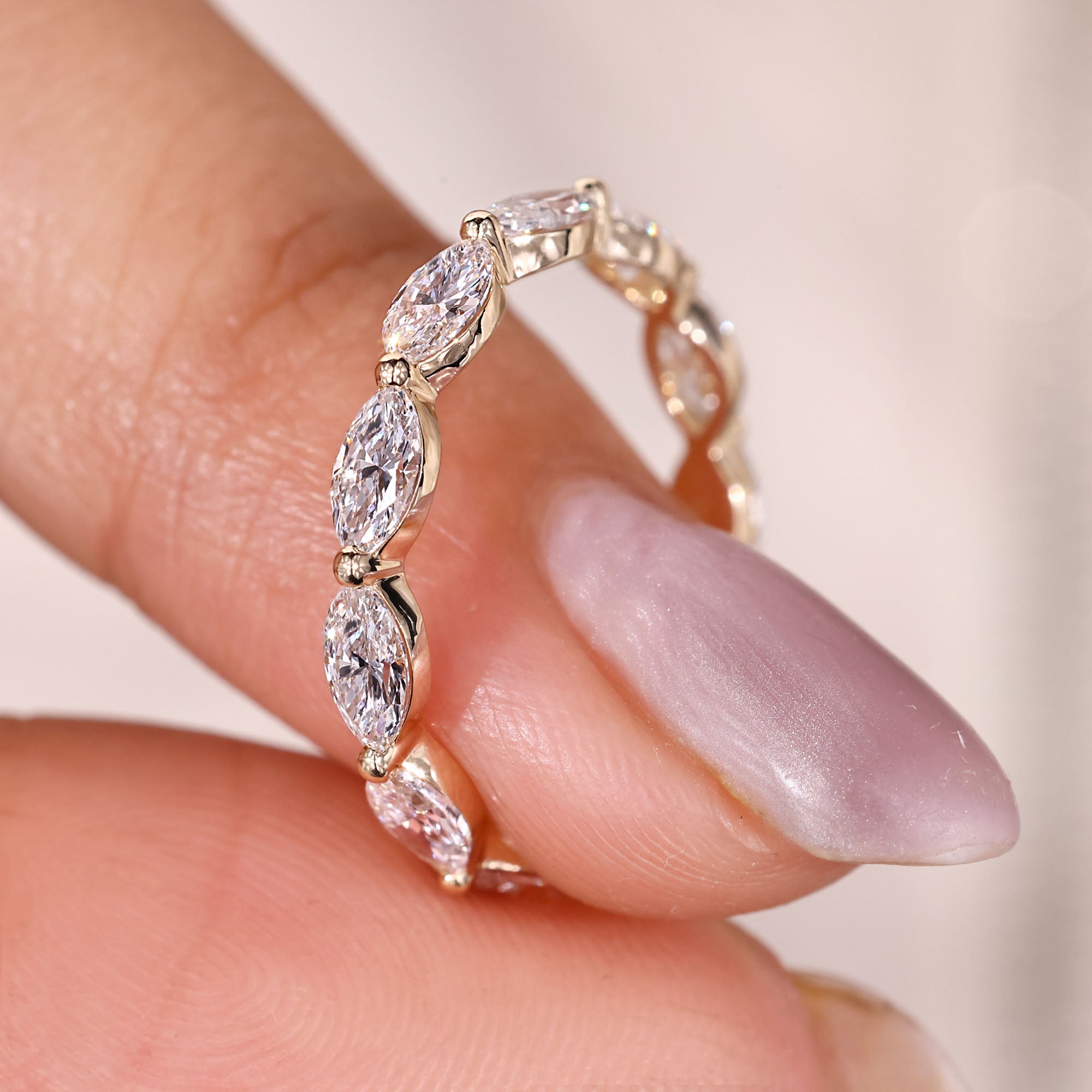 Marquise diamond wedding band with full eternity design.