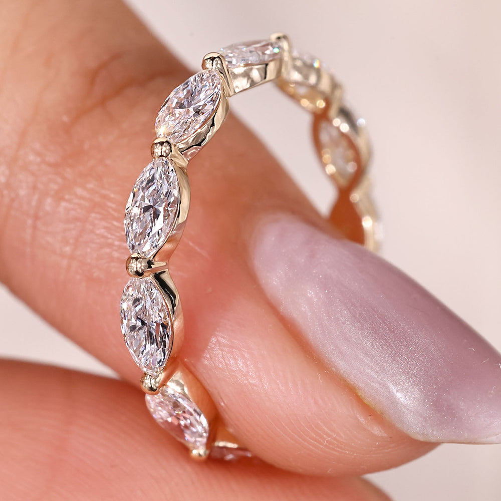 Marquise diamond wedding band with full eternity design.