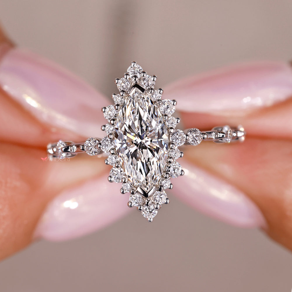buy engagement ring with custom marquise and round diamond design.
