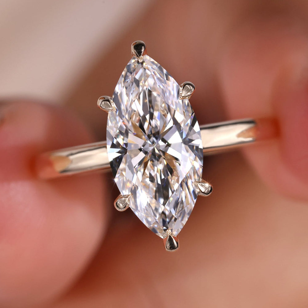 Marquise diamond ring in a stunning marquise engagement ring design.
