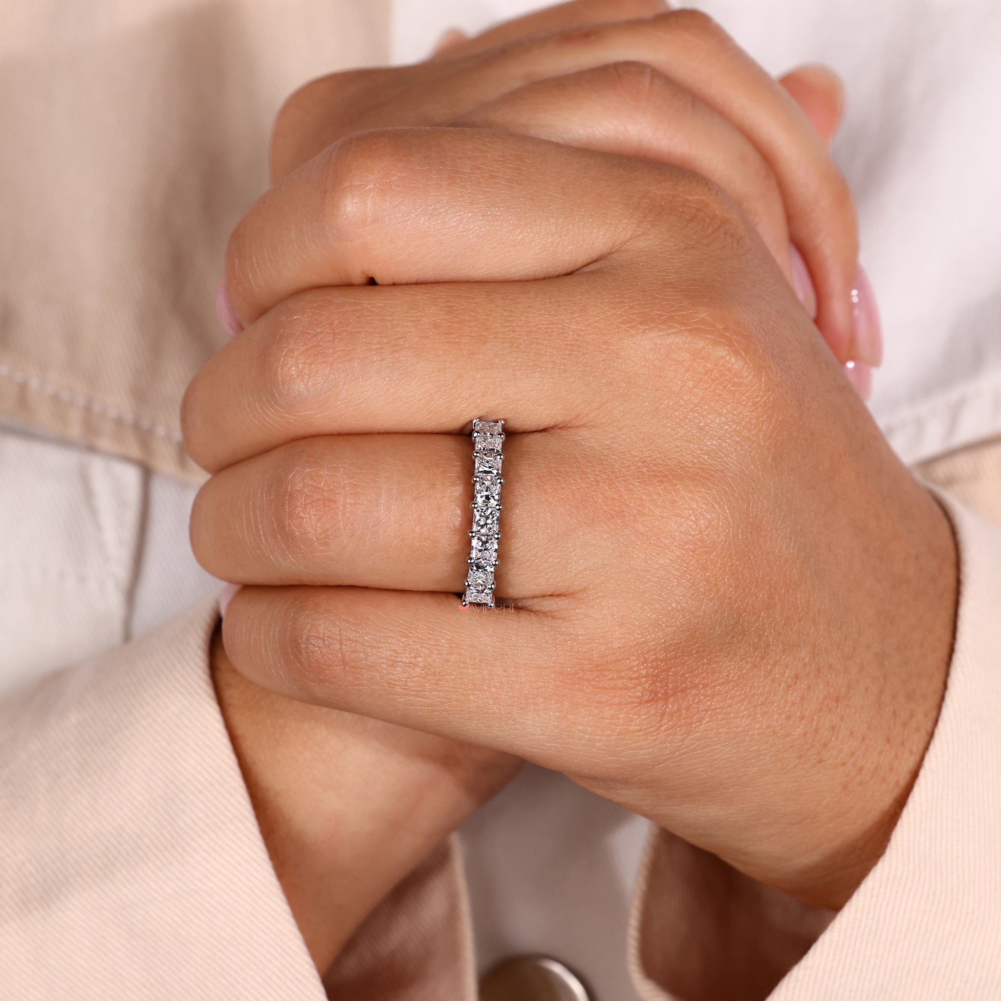 
Three Row Diamond Band: For a striking statement, a brilliant three-row diamond band with finely tuned rows of scintillating diamonds
