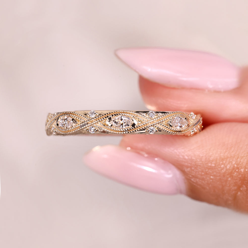 Full eternity band with marquise diamonds.
