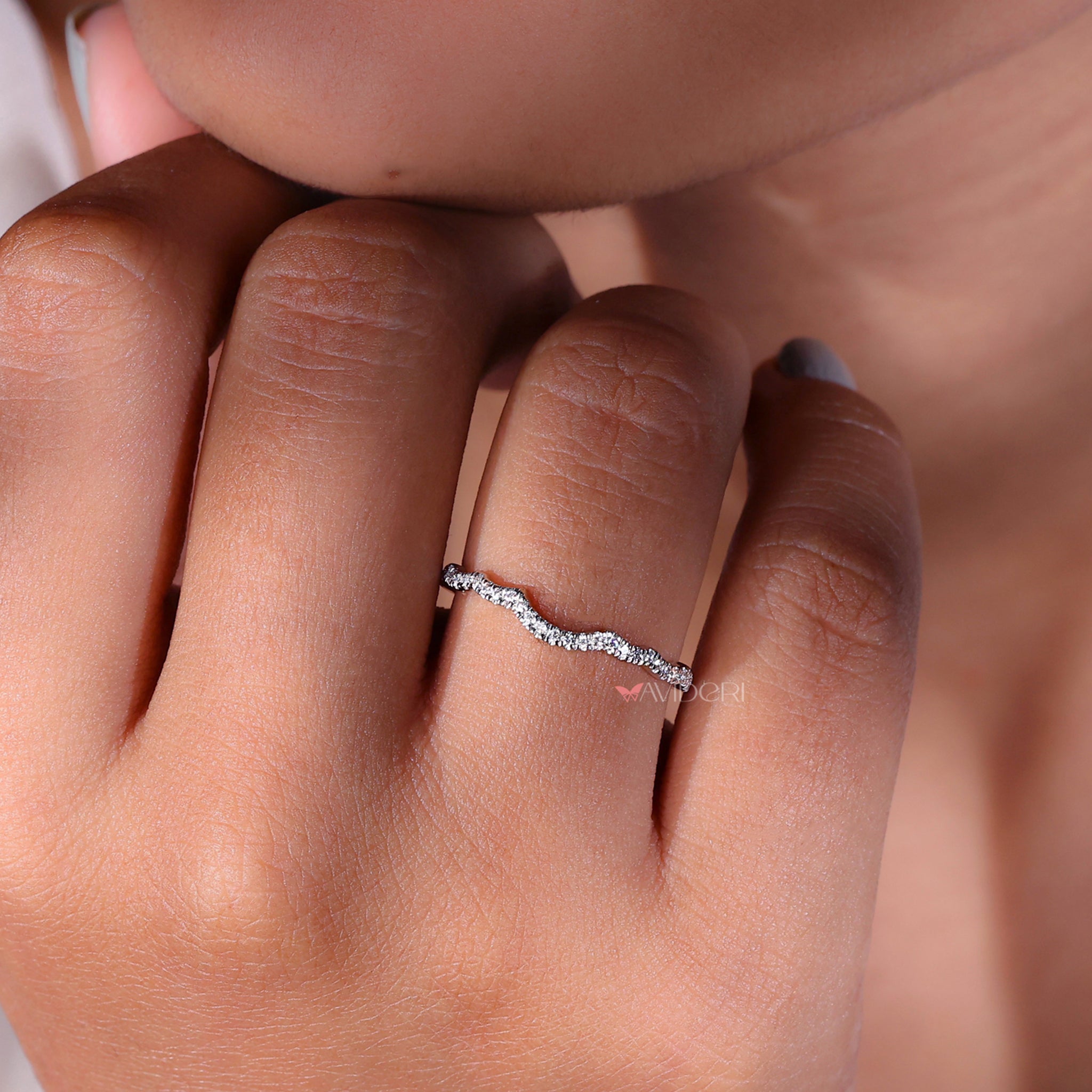 Round diamond wedding band with a classic design.
