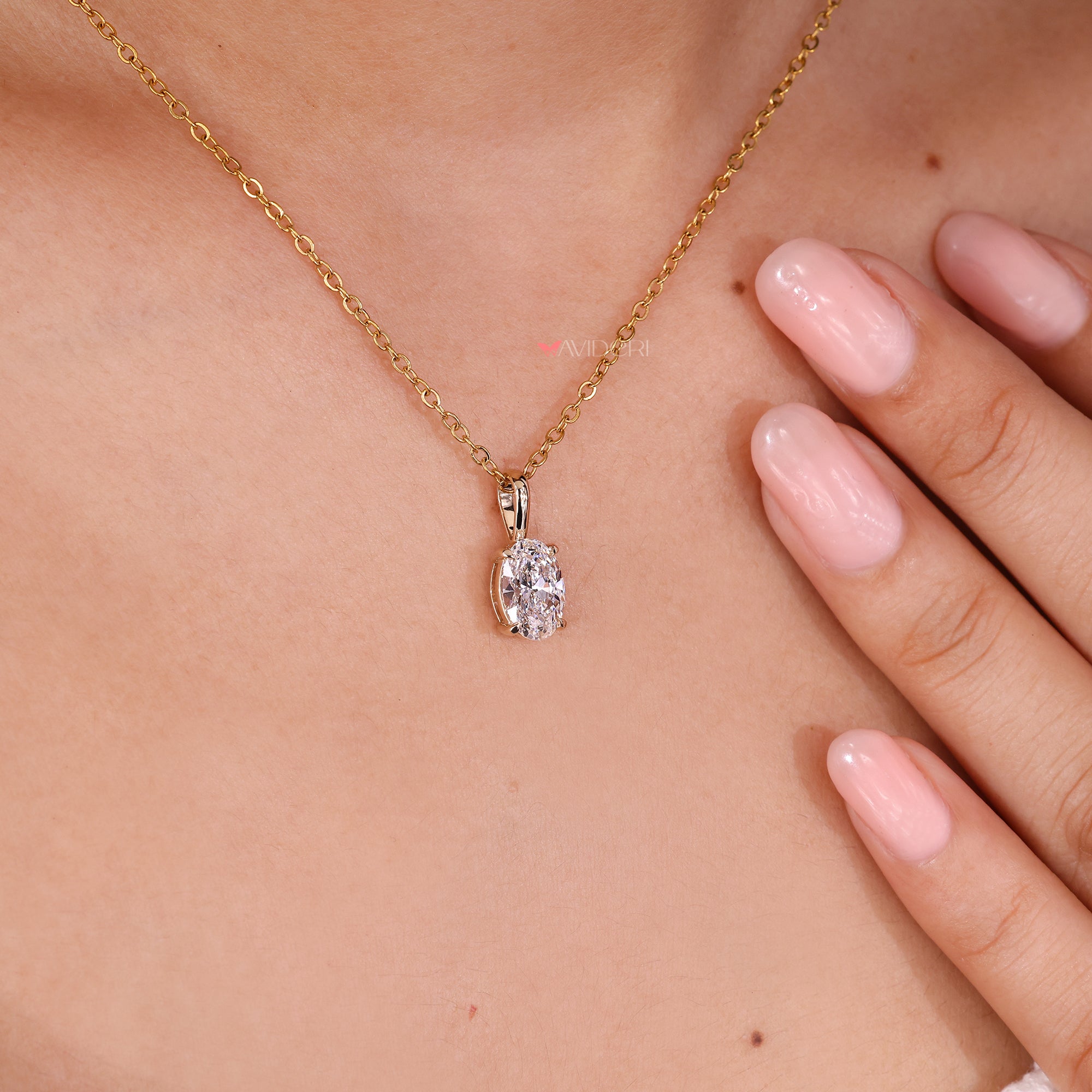 Oval solitaire pendant made in handmade jewelry style.