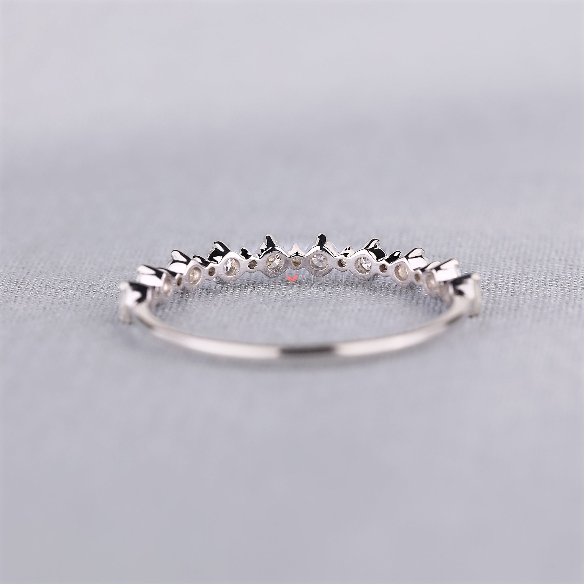 Classic moissanite half eternity band by Avideri.
