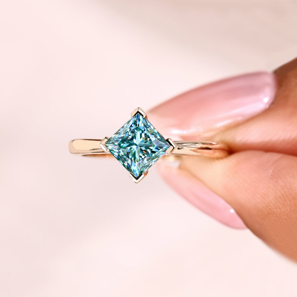 Solitaire moissanite ring with v prong setting.
