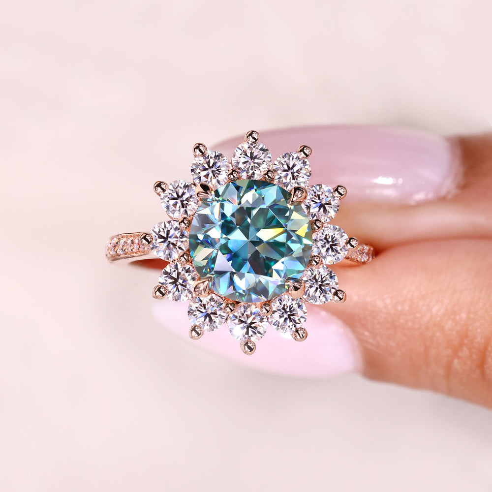 Cyan blue moissanite ring cluster and pave style.
