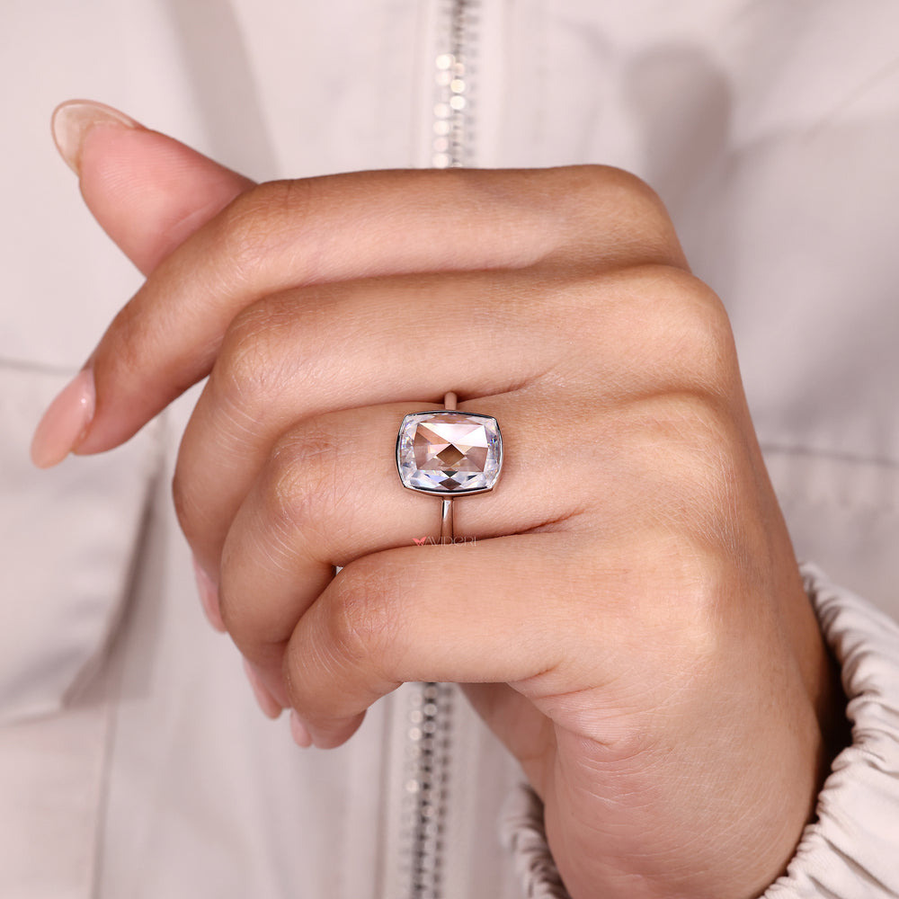 Moissanite solitaire ring with cushion rose cut stone.
