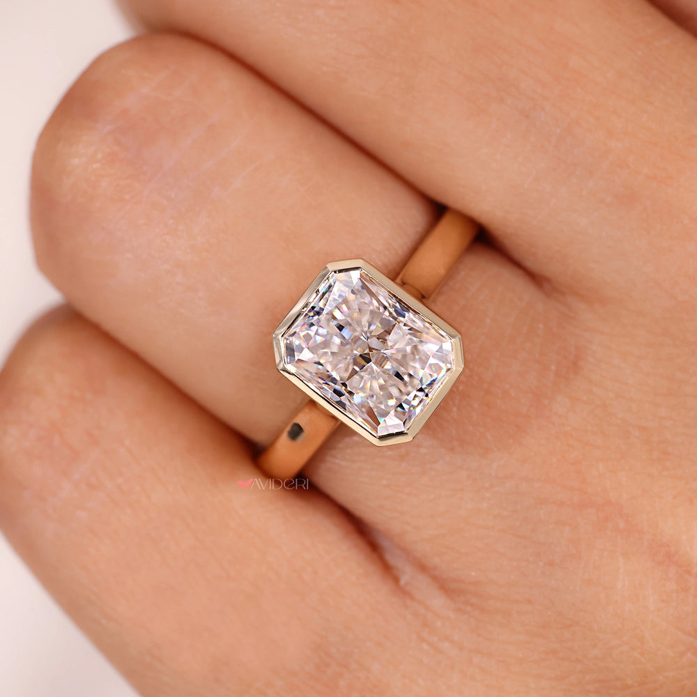 Radiant cut shape adds bright sparkle to the ring.