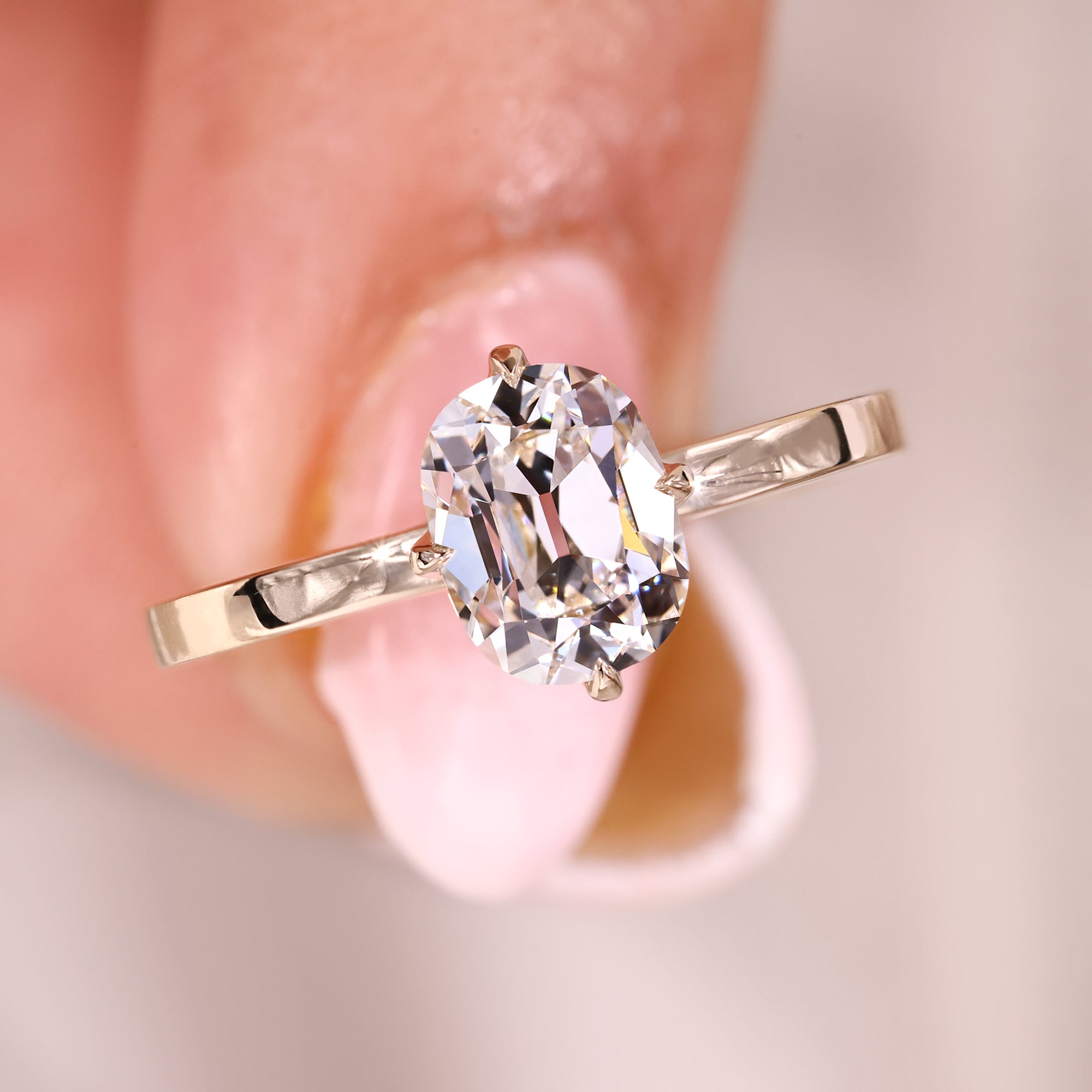 Handmade ring in tulip setting design.