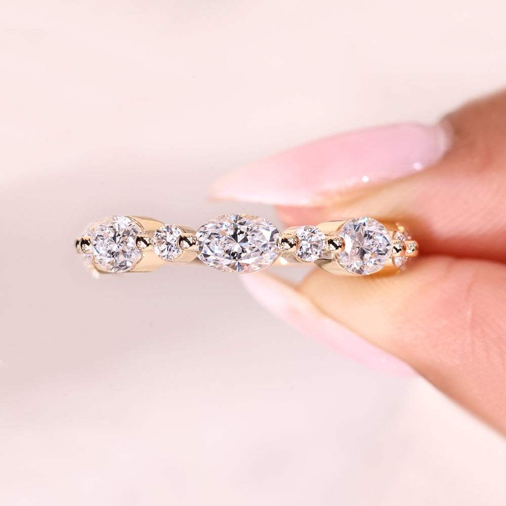 Lab grown half eternity diamond band prong setting.
