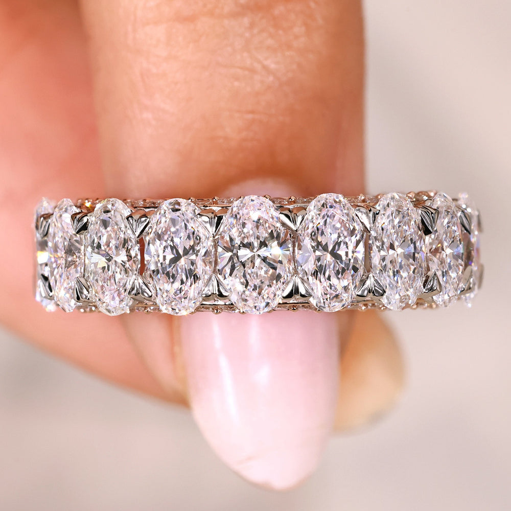 Oval cut diamond band three row pave eternity.
