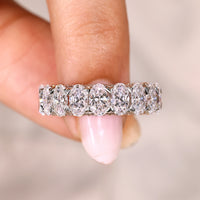 Oval Cut Diamond Band with Three Row Pave Style