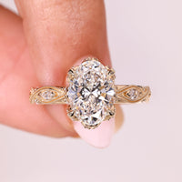 Oval Cut Diamond Engagement Ring with Floral Hidden Halo Style