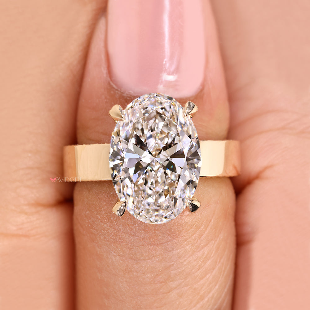 Handmade oval ring with double pave style.

