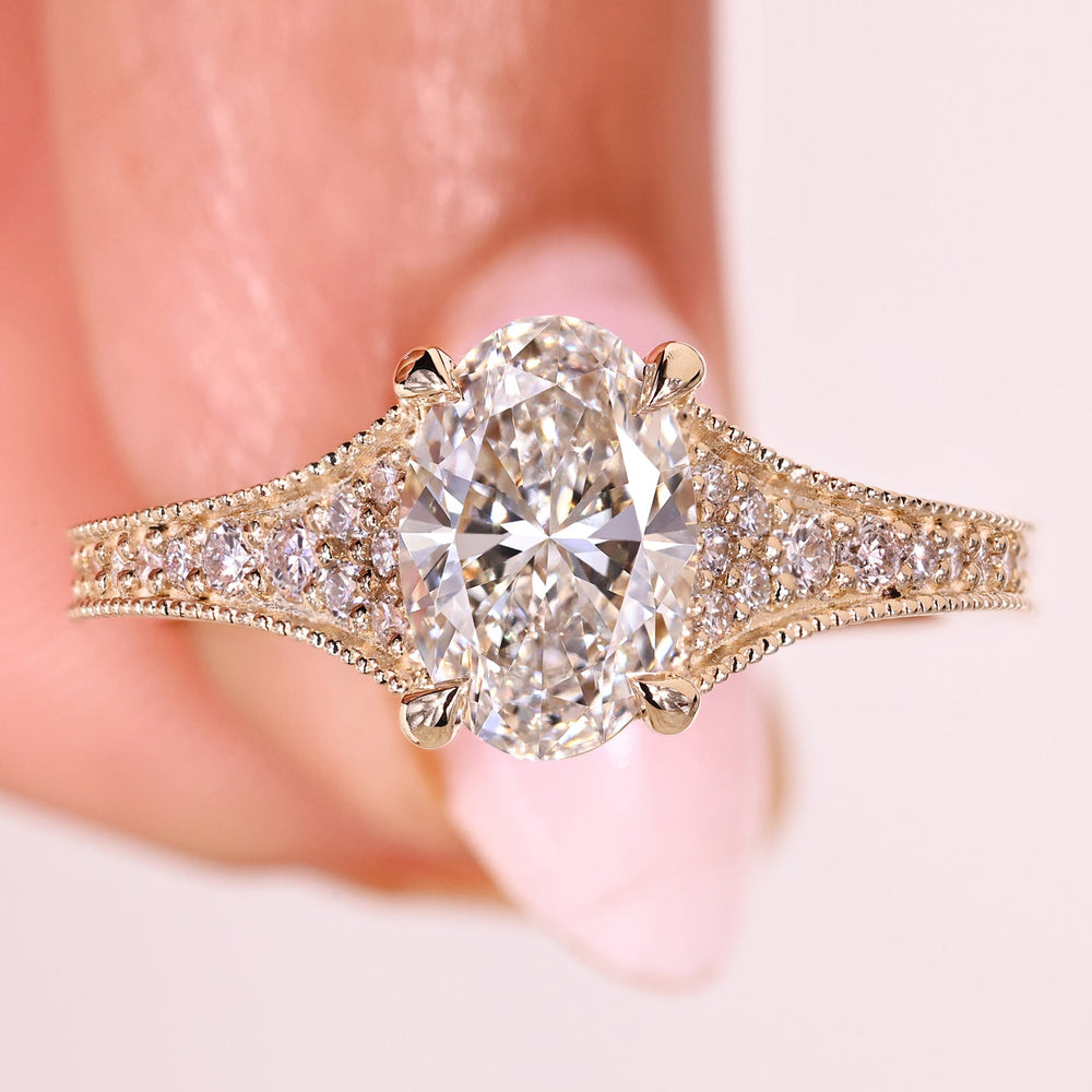Oval cut diamond ring tapered pave vintage.
