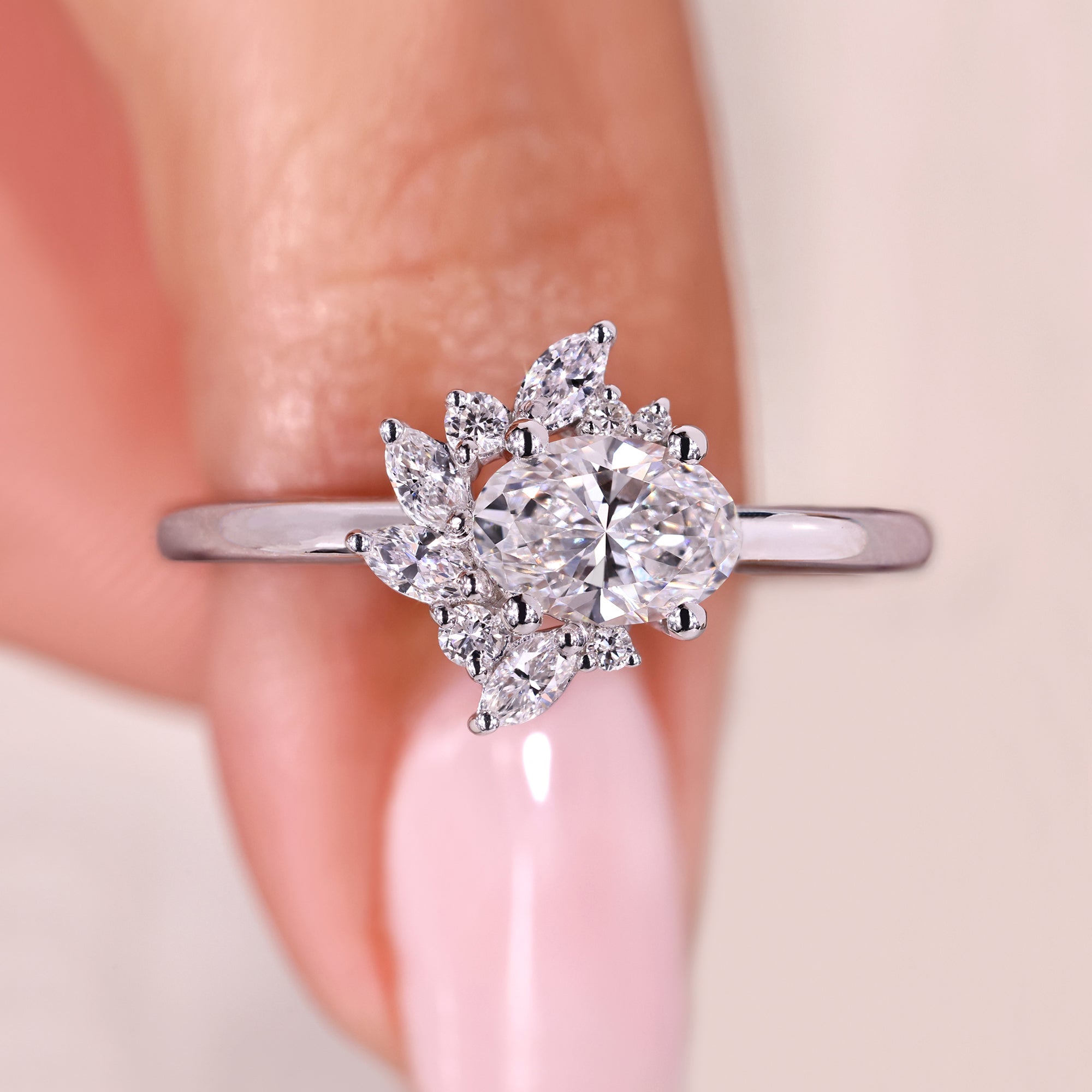 Oval cut diamond ring in east to west setting.
