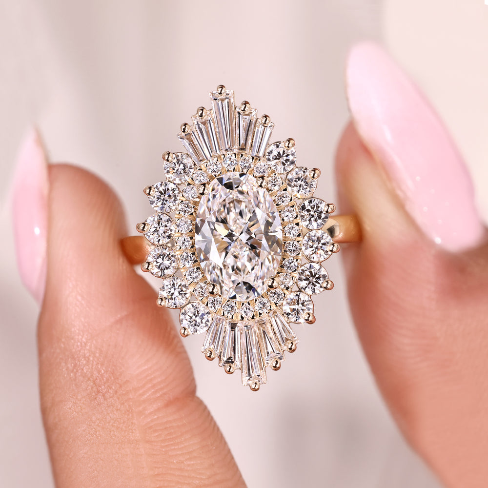 Oval lab grown diamond ring with four prongs.