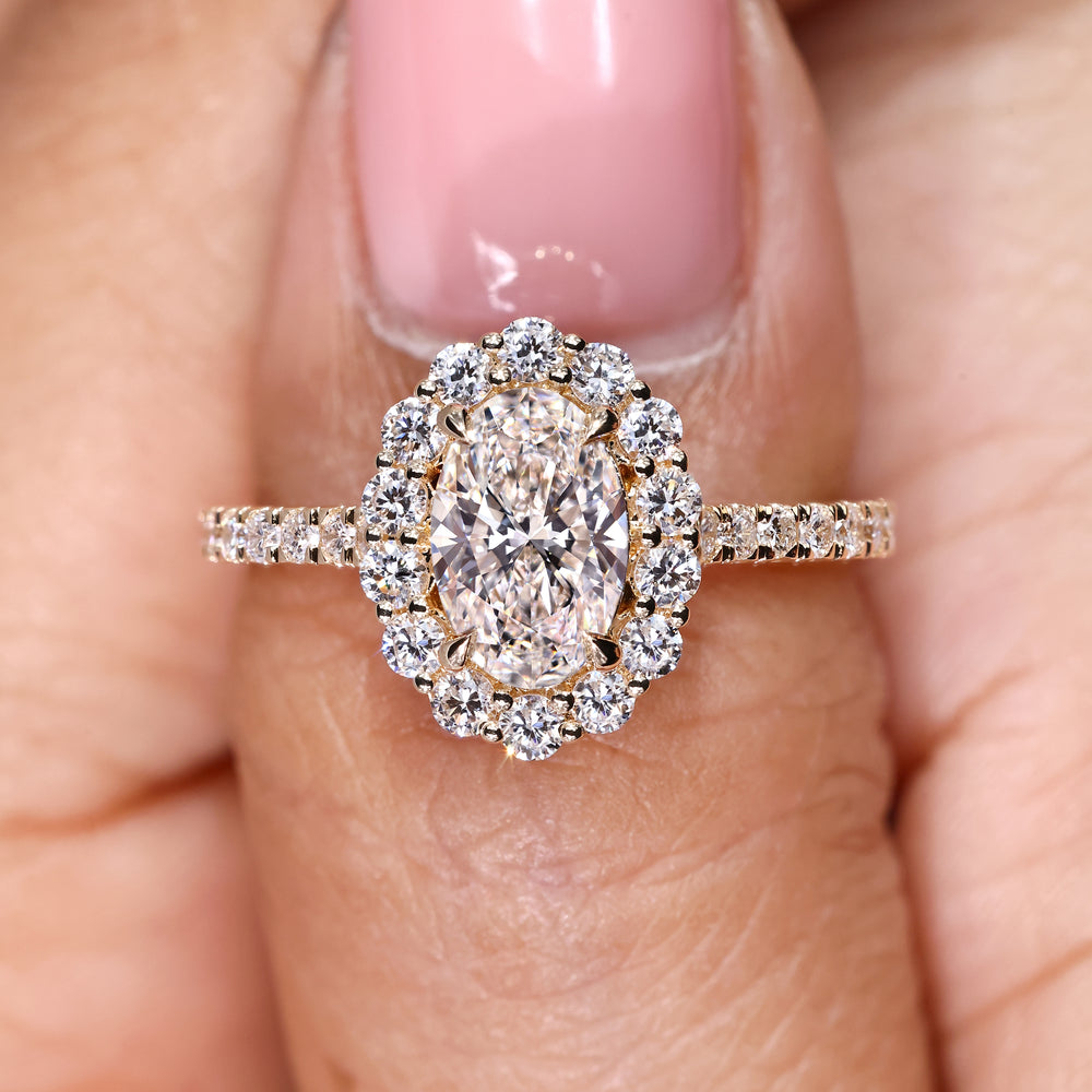 Handmade oval ring with pave and cathedral setting details
