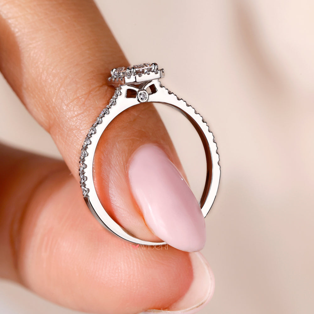 Emerald cut diamond ring in white gold.
