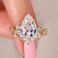 5 Carat IGI Certified Pear Cut Diamond Ring in Cluster Setting