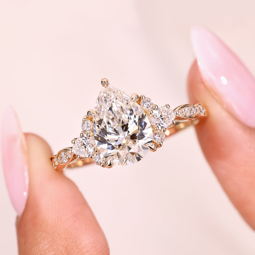 Pear cut ring with five claw prong setting style.
