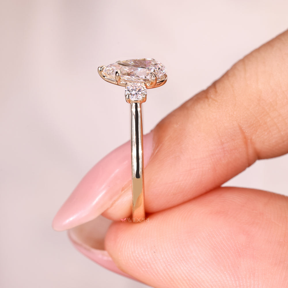 IGI certified pear diamond ring with five claw prongs
