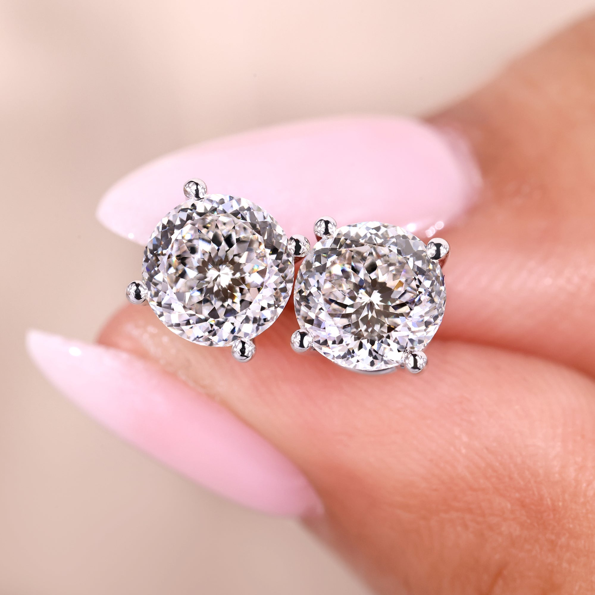 Portuguese cut diamond stud earrings in white gold.