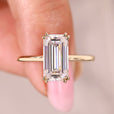 Emerald cut moissanite engagement ring solitaire.

