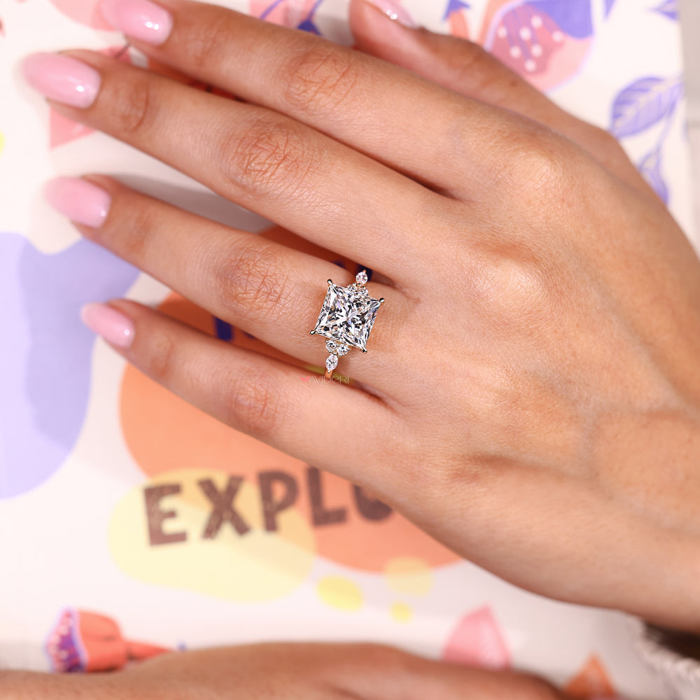 Seven stone princess cut diamond ring with muse setting.