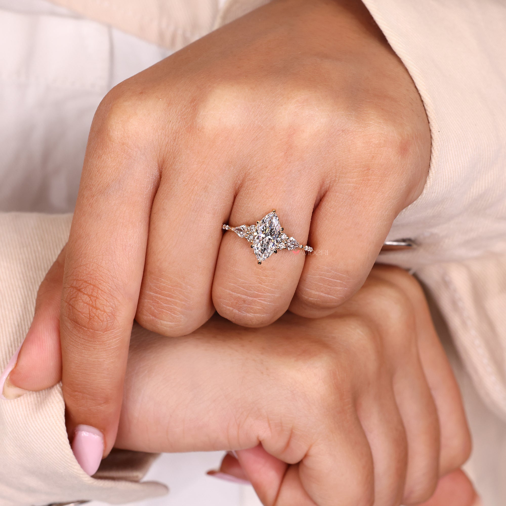 Unique engagement ring with claw prong setting.
