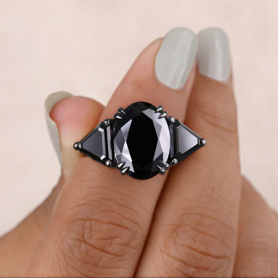 Three stone oval engagement ring with brilliant sparkle.
