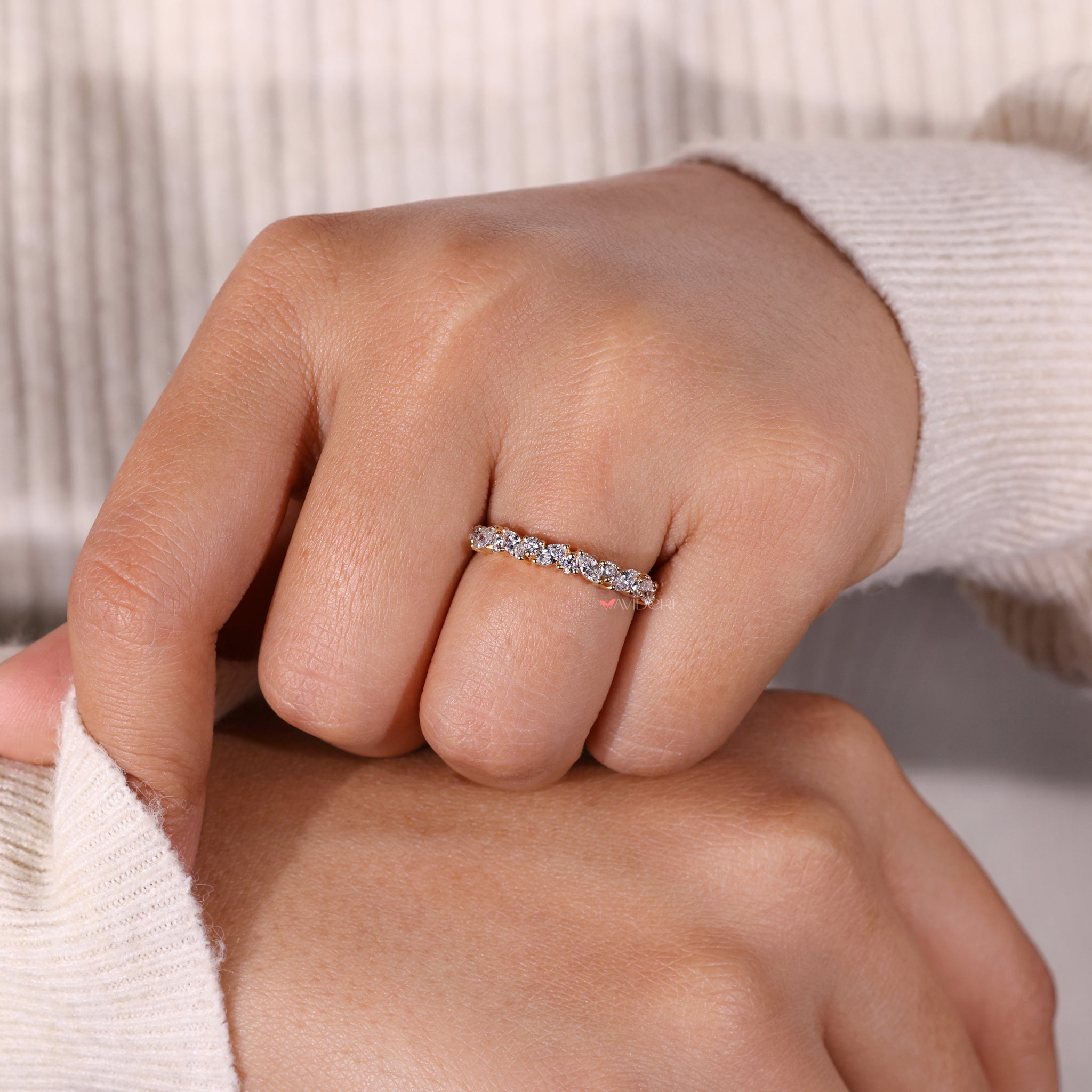 Marquise diamond wedding band set with round diamonds for an exquisite finish.