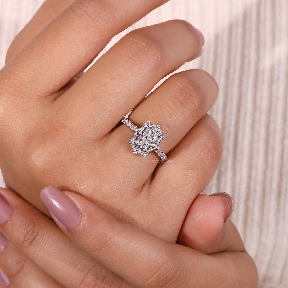 Lab grown diamond in a halo diamond engagement ring for eco-conscious elegance.
