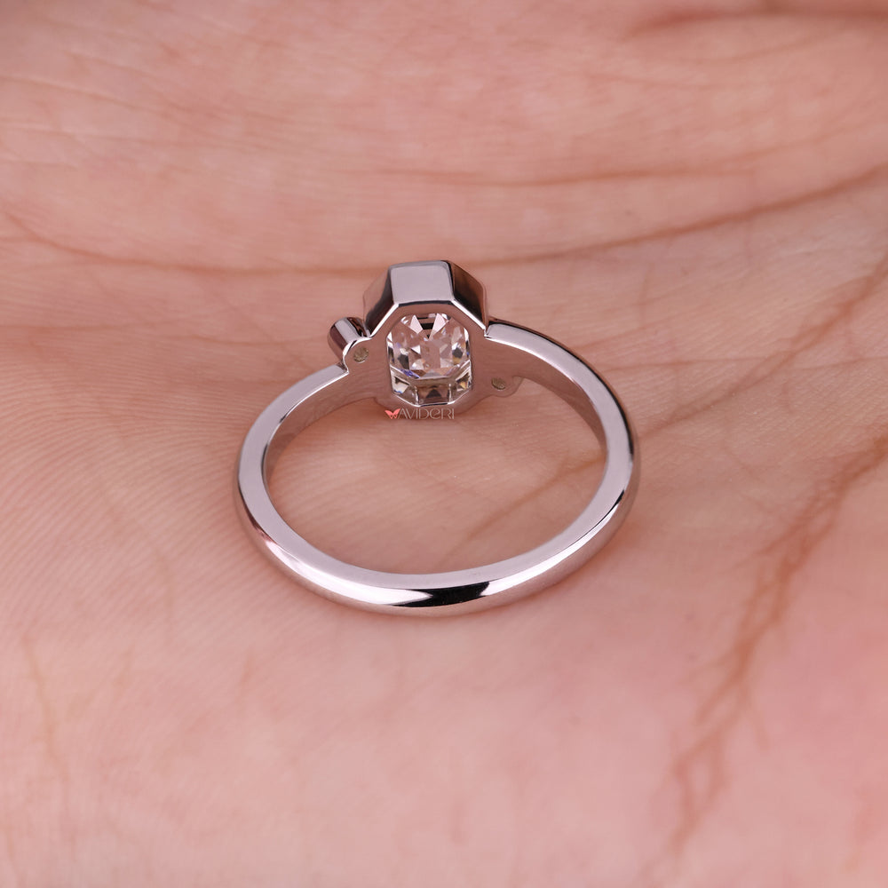 Exquisite round cut diamond highlighting a sparkling center stone.
