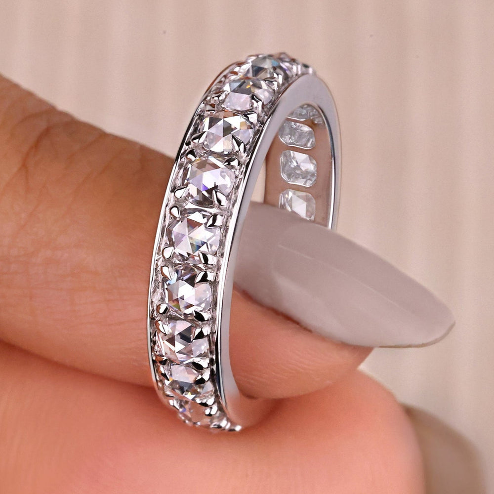Eternity wedding band with round rose cut lab grown diamonds.
