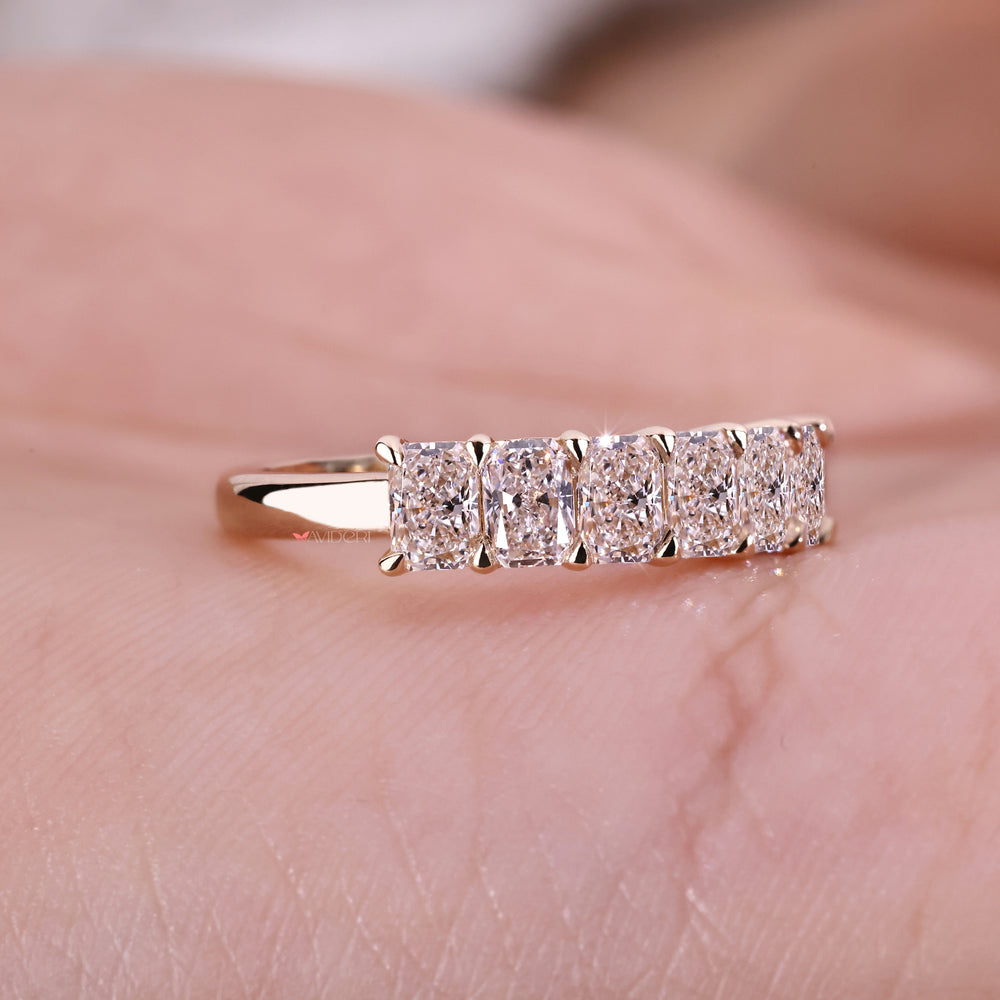 Classic yellow gold wedding band with radiant diamonds for a warm, timeless appeal.
