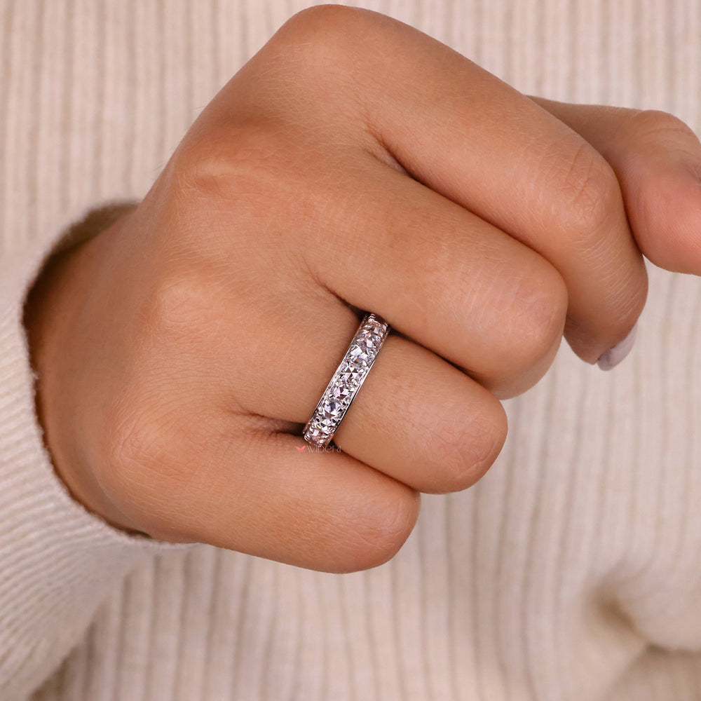 Round rose cut diamonds in a simple, handmade band.
