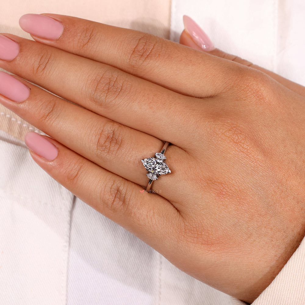 3 stone marquise diamond engagement rings designed with precision, showcasing a handmade ring with modern elegance.
