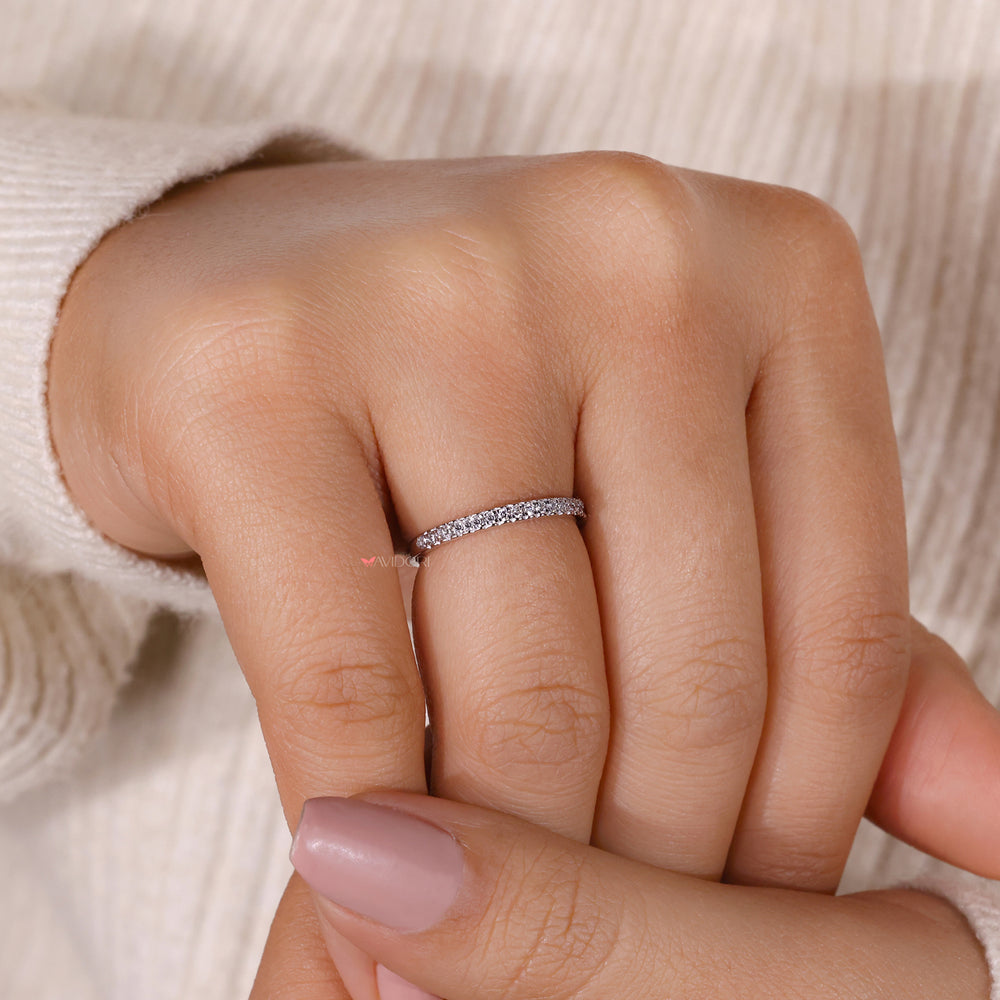 Avideri wedding band showing round diamonds set in classic white gold.
